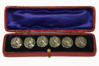 Lot 34 - A cased set of six Art Nouveau silver buttons