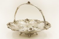 Lot 127 - A Victorian silver swing handled dish