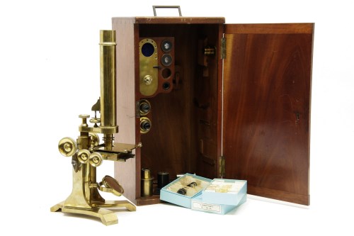 Lot 217 - A brass monocular microscope