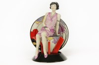 Lot 212A - A limited edition figure of Clarice Cliff