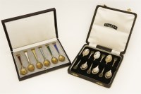Lot 131 - Two sets of plated and gilt coffee spoons
