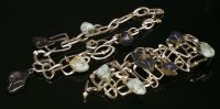Lot 1570 - A bicolour Christian Lacroix necklace and bracelet suite