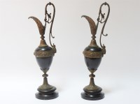 Lot 503A - Pair of bronze black marble ewers