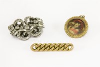 Lot 43 - A gold curb link brooch (tested as approximately 9ct gold)