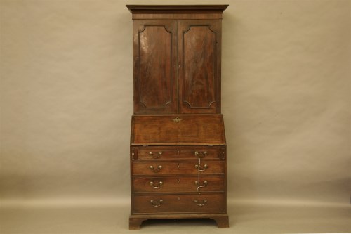 Lot 489 - A George III mahogany bureau bookcase