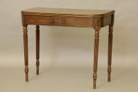 Lot 596 - A George III Scottish mahogany fold over tea table