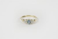 Lot 18 - A 9ct gold three stone topaz and diamond ring
1.84g size O