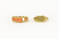 Lot 2 - An 18ct gold five stone graduated coral cabochon ring