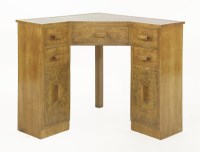 Lot 421 - An Art Deco walnut corner desk