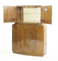 Lot 214 - A walnut two-tier cocktail cabinet