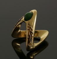 Lot 489 - A Continental gold and turquoise set wishbone ring