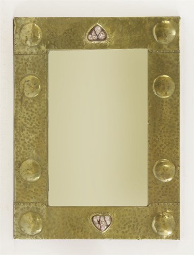 Lot 80 - An Arts & Crafts brass mirror