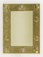 Lot 80 - An Arts & Crafts brass mirror
