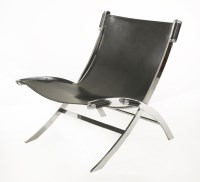 Lot 559 - A chrome and black leather chair