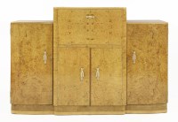 Lot 254 - An Art Deco burr maple cocktail cabinet
