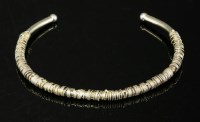 Lot 510 - A sterling silver gilt torque necklace