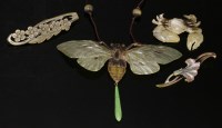 Lot 108 - An Art Nouveau carved horn moth pendant