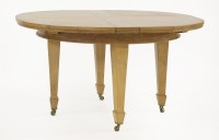 Lot 144 - An oak dining table