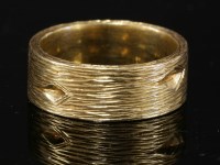 Lot 488 - An 18ct gold band ring by Kutchinsky