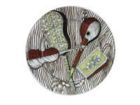 Lot 525 - A Fornasetti 'Strumenti Musicali' plate