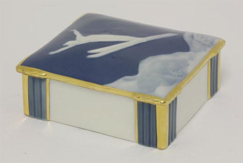 Lot 167 - A Limoges porcelain pâte-sur-pâte cigarette box and cover