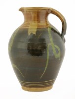 Lot 438 - An earthenware jug