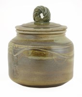 Lot 442 - A stoneware jar and cover