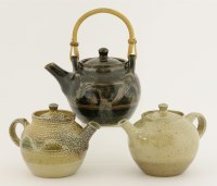 Lot 458 - Three salt-glazed teapots