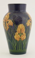 Lot 696 - A Dennis Chinaworks 'Iris' pottery vase