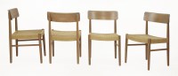 Lot 715 - A set of four Danish teak dining chairs