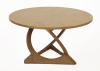 Lot 765 - A Kubus circular teak coffee table