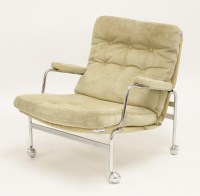 Lot 621 - A 'Karin' suede easy armchair