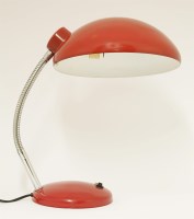 Lot 478 - A red enamel desk lamp