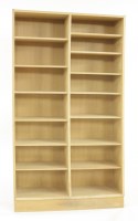 Lot 722 - An oak open bookcase