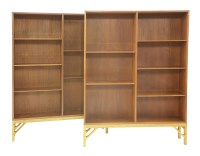 Lot 793 - A pair of teak open 'China' bookcases