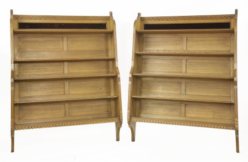 Lot 13 - A pair of oak hanging bookcases