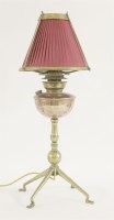 Lot 22 - A brass and copper oil lamp
