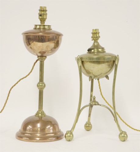 Lot 55 - Two copper and brass oil lamps