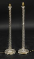 Lot 730 - A pair of glass column table lamps