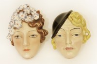 Lot 158 - Two pottery wall masks