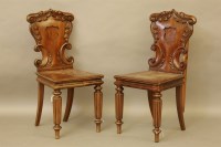 Lot 571 - A pair of George IV mahogany hall chairs