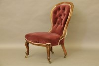 Lot 543 - A Victorian walnut nursing chair