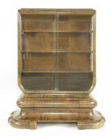 Lot 555 - An Art Deco walnut display cabinet