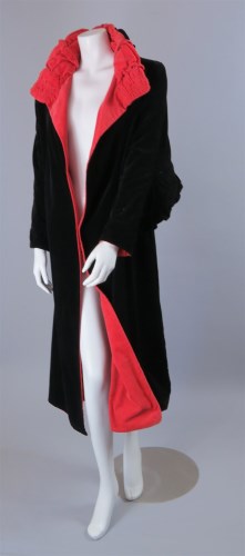 Lot 240 - An Edwardian black velvet opera coat