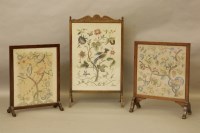 Lot 528 - Three embroidered fire screens
