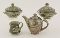 Lot 150 - Two small stoneware pots and covers