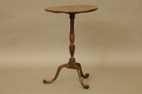 Lot 519 - An Edwardian mahogany circular tilt top table on tripod base
