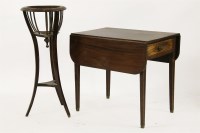 Lot 574A - A 19th century mahogany drop leaf table