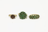 Lot 24 - A 9ct gold linear emerald cluster ring