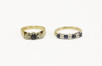 Lot 28 - A 9ct gold five stone diamond and sapphire ring